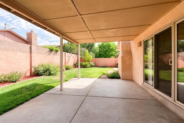 9201 Academy Hills Dr NE, Albuquerque, NM 87111 - fenced backyard featuring a patio