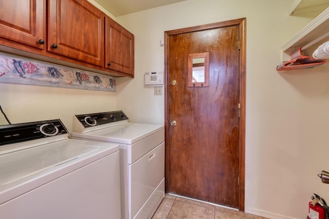 9201 Academy Hills Dr NE, Albuquerque, NM 87111 - washroom with cabinet space, independent washer and dryer, and light tile patterned floors