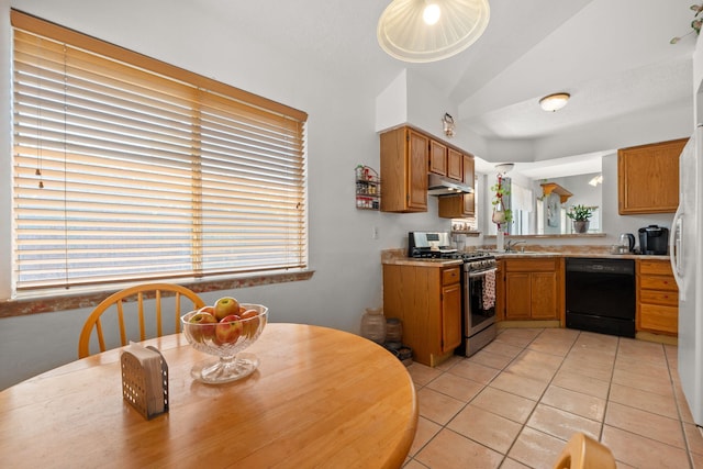 7824 Snowberry St NW, Albuquerque, NM 87120 - kitchen featuring black dishwasher, gas stove, under cabinet range hood, lofted ceiling, and light countertops