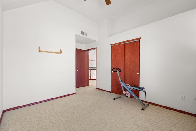 7824 Snowberry St NW, Albuquerque, NM 87120 - empty room featuring carpet floors, ceiling fan, and high vaulted ceiling