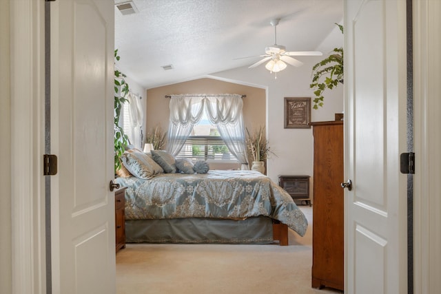 1417 Montiano Loop SE, Rio Rancho, NM 87124 - carpeted bedroom with vaulted ceiling, ceiling fan, and a textured ceiling