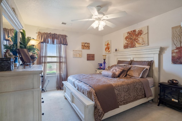 1417 Montiano Loop SE, Rio Rancho, NM 87124 - bedroom featuring light colored carpet and a ceiling fan