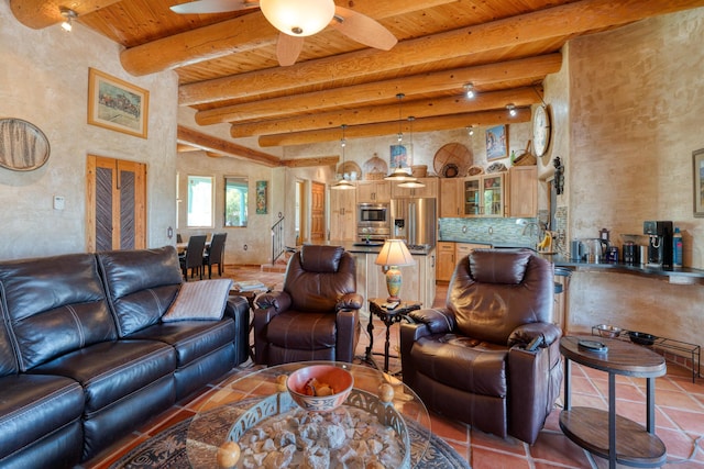 15 Sunset Blvd, Placitas, NM 87043 - living area with a wooden ceiling with exposed beams, a ceiling fan, and light tile patterned floors