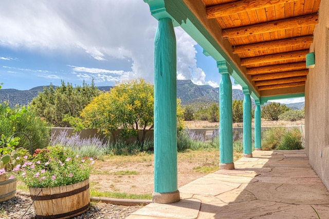 15 Sunset Blvd, Placitas, NM 87043 - fenced backyard featuring a mountain view and a patio