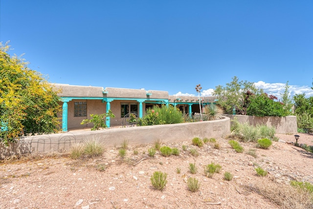 15 Sunset Blvd, Placitas, NM 87043 - back of property featuring stucco siding