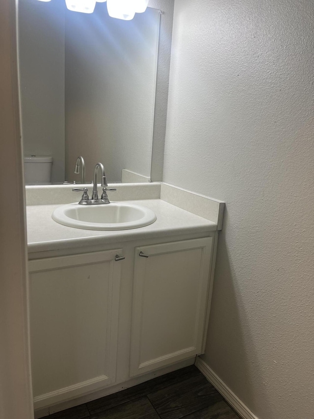 3005 Quail Point Dr, Albuquerque, NM 87120 - bathroom with vanity and a textured wall