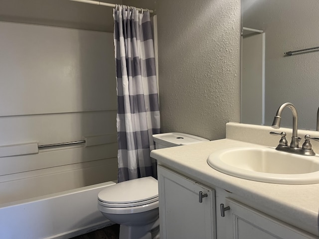 3005 Quail Point Dr, Albuquerque, NM 87120 - bathroom with vanity, a textured wall, shower / tub combo, and wood finished floors