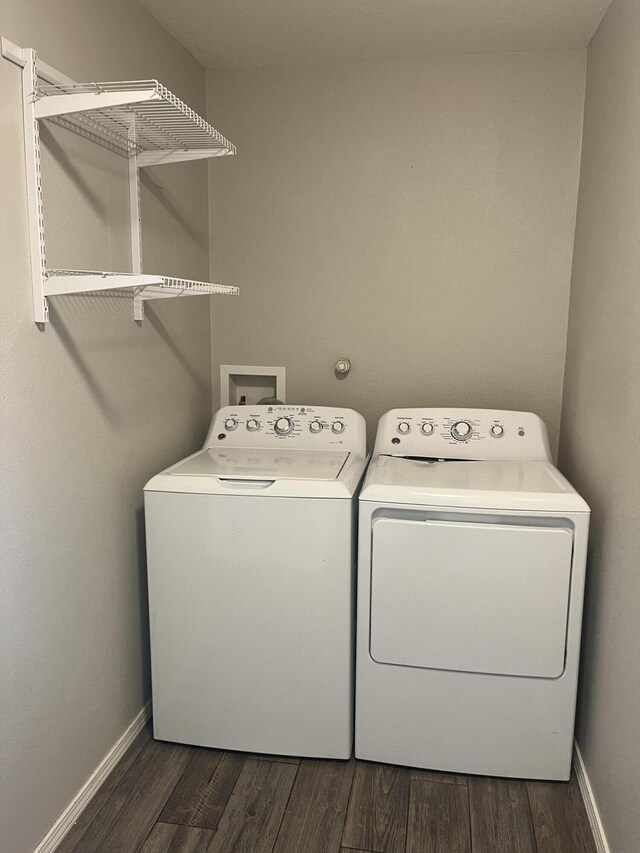 3005 Quail Point Dr, Albuquerque, NM 87120 - laundry room featuring washing machine and dryer and dark wood-type flooring