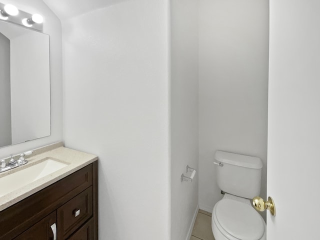 5355 Feather Rock Pl NW, Albuquerque, NM 87114 - half bathroom featuring vanity and tile patterned floors