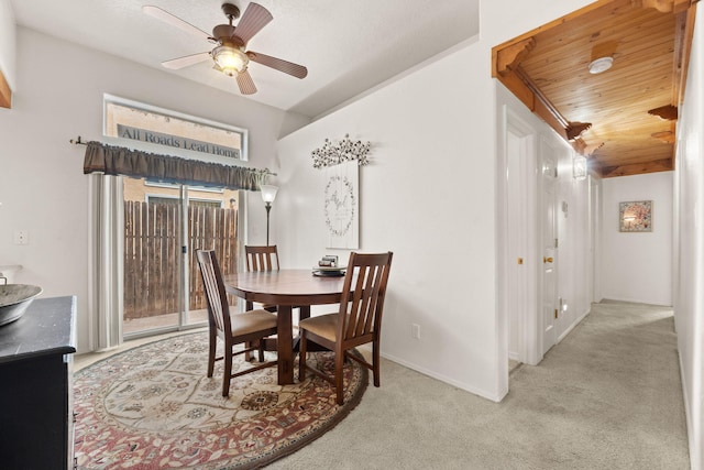455 Colonial Ave SW, Los Lunas, NM 87031 - dining room with carpet floors, a ceiling fan, and wood ceiling