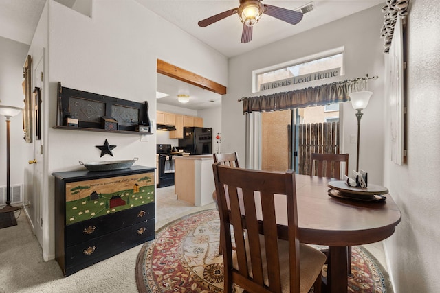 455 Colonial Ave SW, Los Lunas, NM 87031 - dining room featuring light colored carpet and ceiling fan