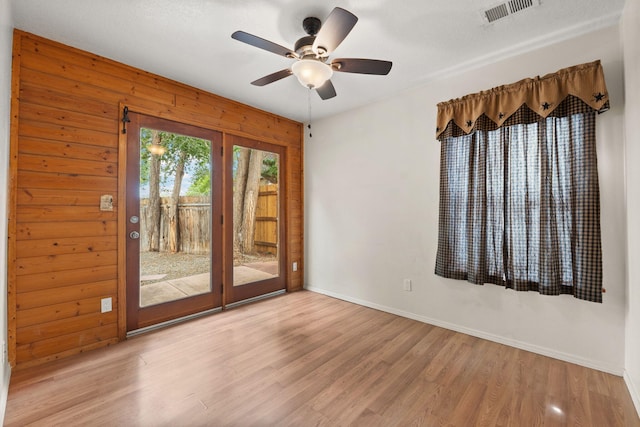 455 Colonial Ave SW, Los Lunas, NM 87031 - unfurnished room featuring wood finished floors and a ceiling fan