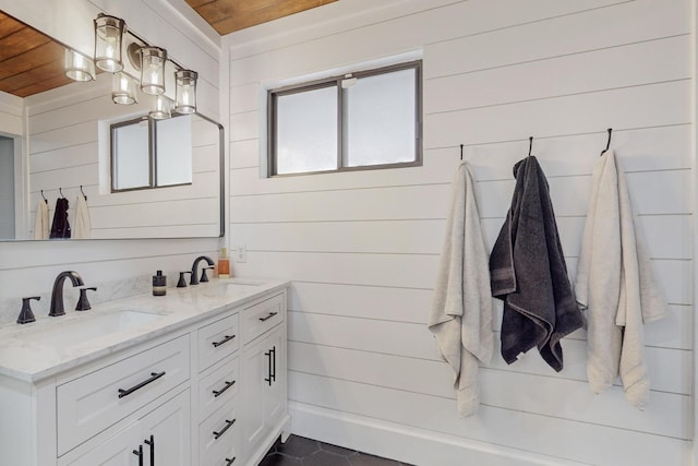 4320 Blumenshine Cir SW, Albuquerque, NM 87105 - full bath with wooden ceiling, double vanity, wooden walls, and tile patterned flooring