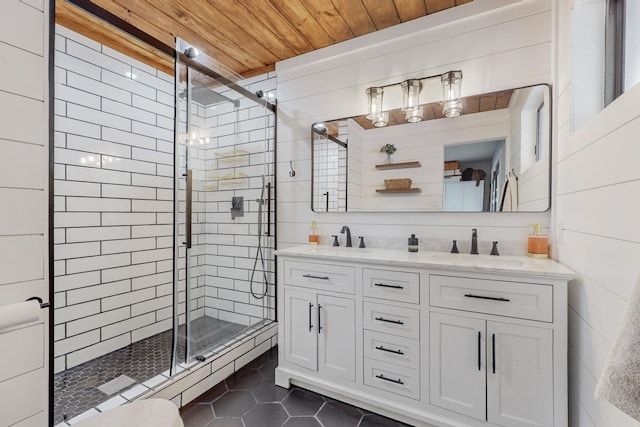 4320 Blumenshine Cir SW, Albuquerque, NM 87105 - bathroom with wood ceiling, tile patterned floors, a stall shower, and double vanity