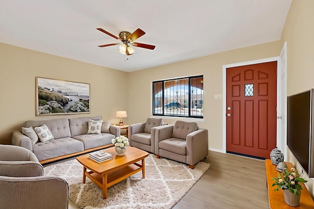 10409 Britt Ct NE, Albuquerque, NM 87112 - living area with light wood-type flooring and ceiling fan