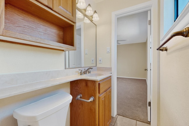 10409 Britt Ct NE, Albuquerque, NM 87112 - half bathroom featuring vanity, tile patterned floors, and ceiling fan