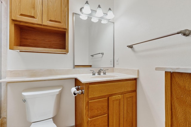 10409 Britt Ct NE, Albuquerque, NM 87112 - half bathroom featuring vanity and toilet