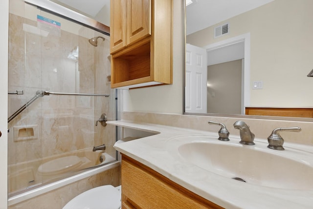 10409 Britt Ct NE, Albuquerque, NM 87112 - full bathroom featuring vanity and combined bath / shower with glass door