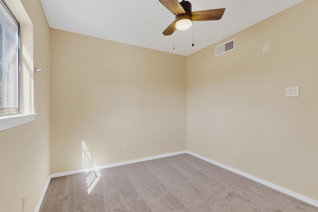 10409 Britt Ct NE, Albuquerque, NM 87112 - empty room with a ceiling fan and carpet flooring
