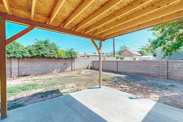 10409 Britt Ct NE, Albuquerque, NM 87112 - fenced backyard featuring a patio area