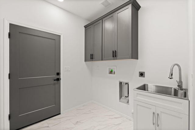 1109 11th St SE, Rio Rancho, NM 87124 - washroom with light marble finish flooring, electric dryer hookup, cabinet space, and hookup for a washing machine