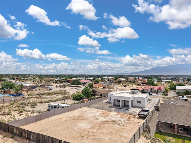 1109 11th St SE, Rio Rancho, NM 87124 - aerial perspective of suburban area featuring a mountainous background