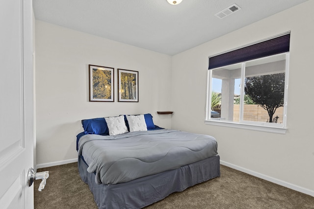44 Los Balcones Pl NE, Rio Rancho, NM 87124 - carpeted bedroom with baseboards