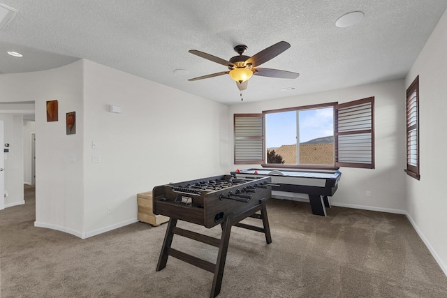 44 Los Balcones Pl NE, Rio Rancho, NM 87124 - game room with carpet floors, a ceiling fan, and a textured ceiling