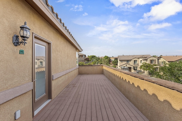 44 Los Balcones Pl NE, Rio Rancho, NM 87124 - wooden deck with a residential view