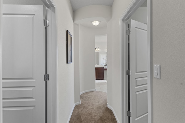 44 Los Balcones Pl NE, Rio Rancho, NM 87124 - hall featuring carpet and baseboards