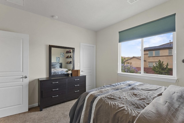 44 Los Balcones Pl NE, Rio Rancho, NM 87124 - bedroom with light colored carpet and baseboards