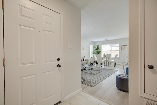 4920 Black Dr NW, Albuquerque, NM 87120 - entrance foyer with baseboards and light wood-style flooring