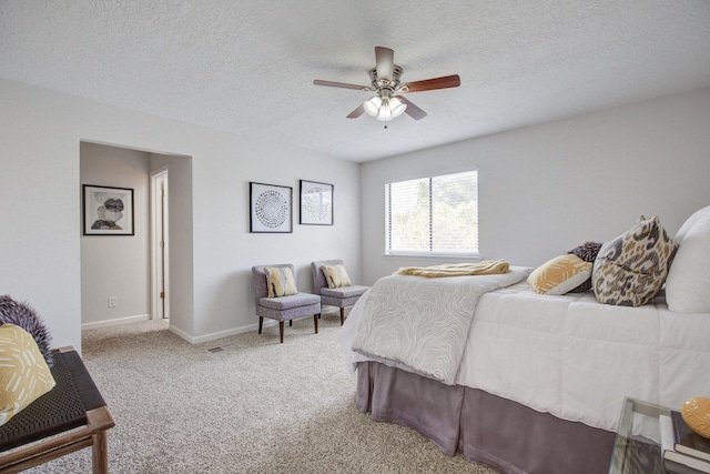 4920 Black Dr NW, Albuquerque, NM 87120 - bedroom featuring carpet flooring, a textured ceiling, and a ceiling fan