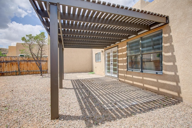 4920 Black Dr NW, Albuquerque, NM 87120 - view of patio with french doors and a pergola