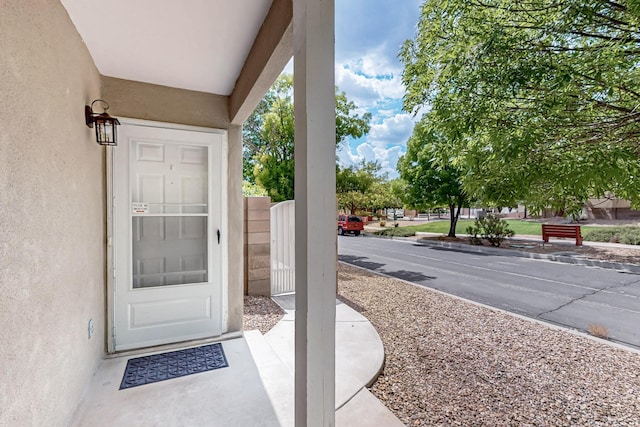 10639 Miera Dr NW, Albuquerque, NM 87114 - doorway to property featuring stucco siding