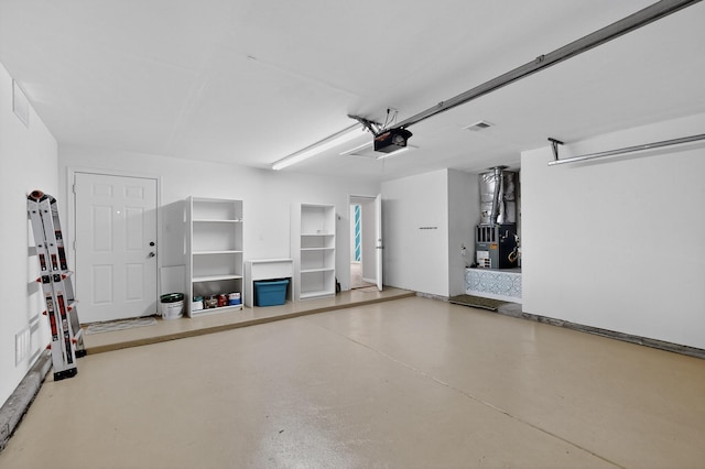 10639 Miera Dr NW, Albuquerque, NM 87114 - garage featuring a garage door opener