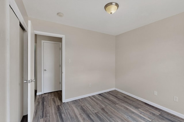 10639 Miera Dr NW, Albuquerque, NM 87114 - empty room with wood finished floors and a smoke detector