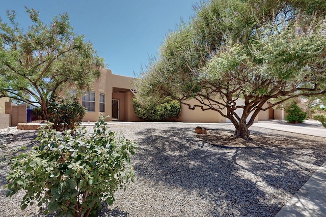 8712 Sandwater Rd NW, Albuquerque, NM 87120 - pueblo-style home with stucco siding
