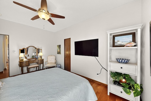 8712 Sandwater Rd NW, Albuquerque, NM 87120 - bedroom with wood finished floors and a ceiling fan