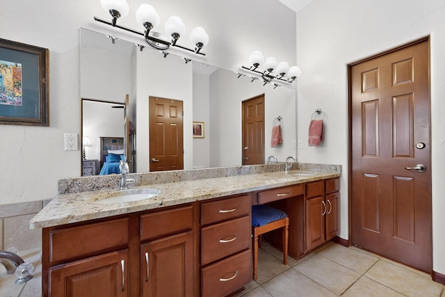 8712 Sandwater Rd NW, Albuquerque, NM 87120 - ensuite bathroom featuring double vanity and tile patterned flooring