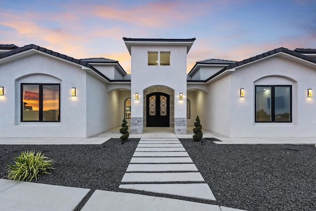 7900 Aguila St NW, Albuquerque, NM 87120 - view of front of house featuring stucco siding and a tiled roof