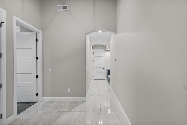 7900 Aguila St NW, Albuquerque, NM 87120 - hall with arched walkways and baseboards