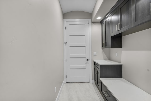 7900 Aguila St NW, Albuquerque, NM 87120 - mudroom with baseboards and lofted ceiling