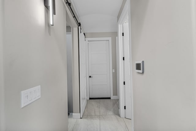 7900 Aguila St NW, Albuquerque, NM 87120 - hall with a barn door and vaulted ceiling