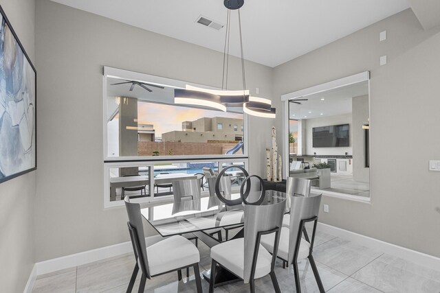 7900 Aguila St NW, Albuquerque, NM 87120 - kitchen with stainless steel refrigerator with ice dispenser, open shelves, light countertops, light marble finish floors, and recessed lighting