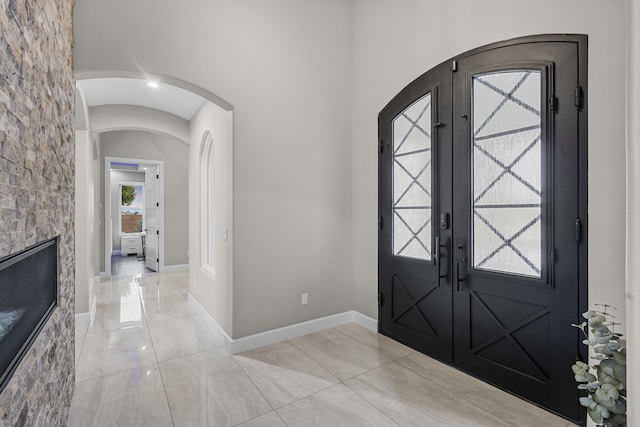 7900 Aguila St NW, Albuquerque, NM 87120 - entrance foyer featuring arched walkways and french doors