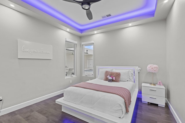 7900 Aguila St NW, Albuquerque, NM 87120 - bedroom with a tray ceiling, wood finished floors, recessed lighting, and a ceiling fan