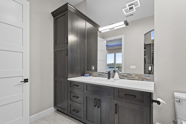 7900 Aguila St NW, Albuquerque, NM 87120 - bathroom featuring backsplash and vanity