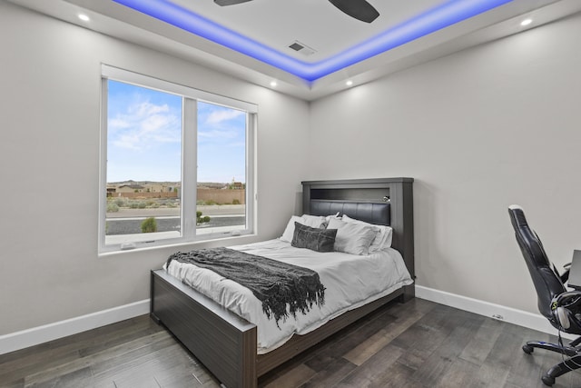 7900 Aguila St NW, Albuquerque, NM 87120 - bedroom with recessed lighting, wood finished floors, ceiling fan, and a tray ceiling
