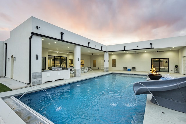 7900 Aguila St NW, Albuquerque, NM 87120 - swimming pool with a water slide and ceiling fan